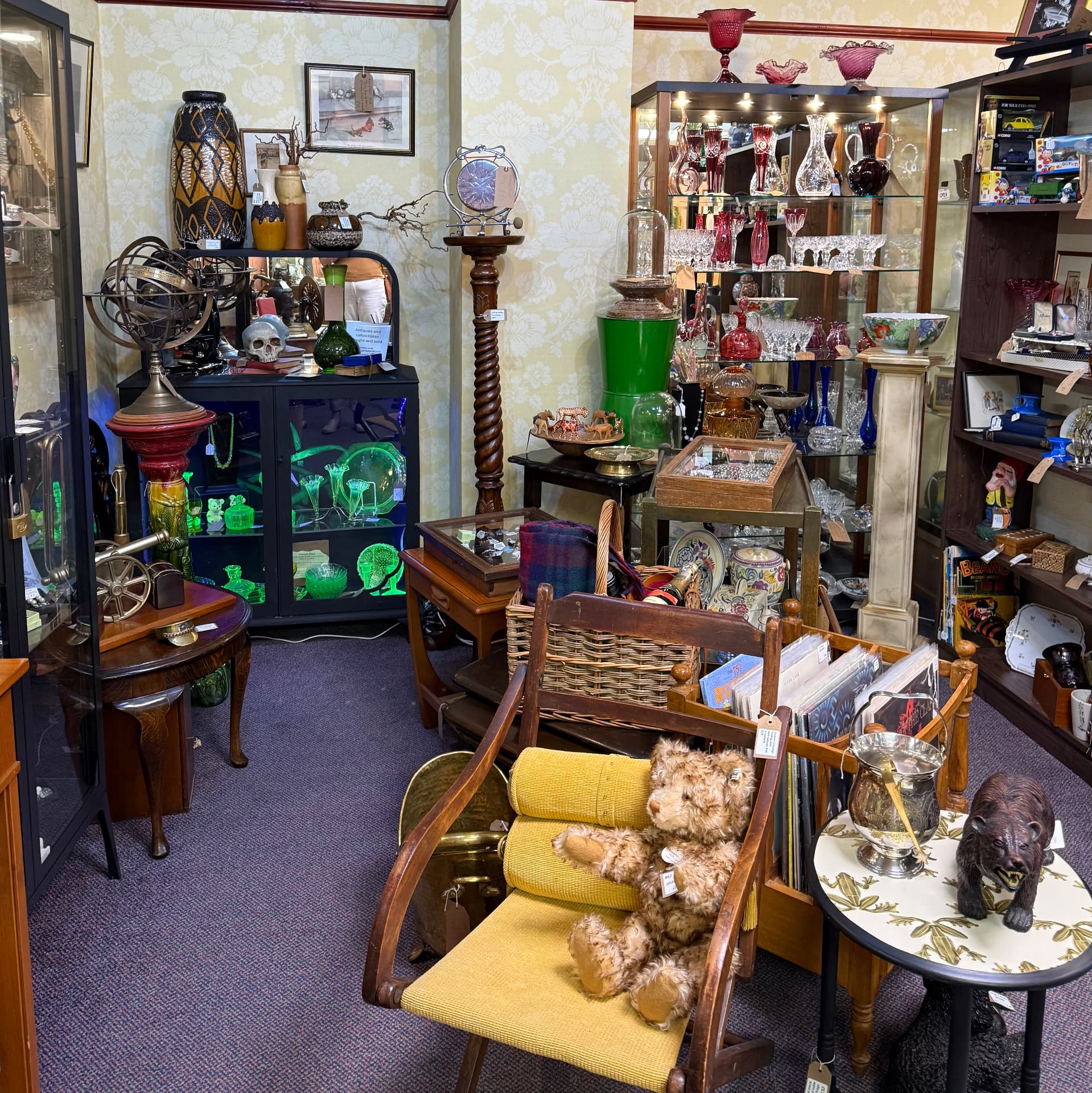 The Atomic Design booth at The Antiques Centre, Olney, filled with curated antiques, jewellery and collectables